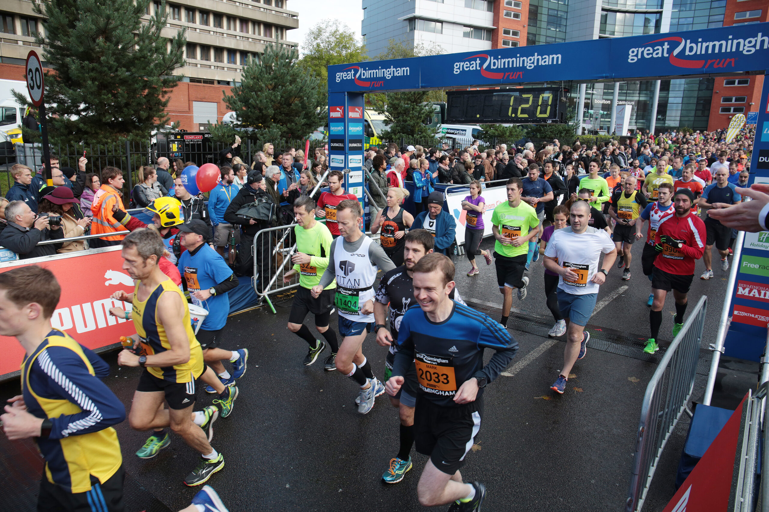 People running with the text of Great Birmingham run in the background