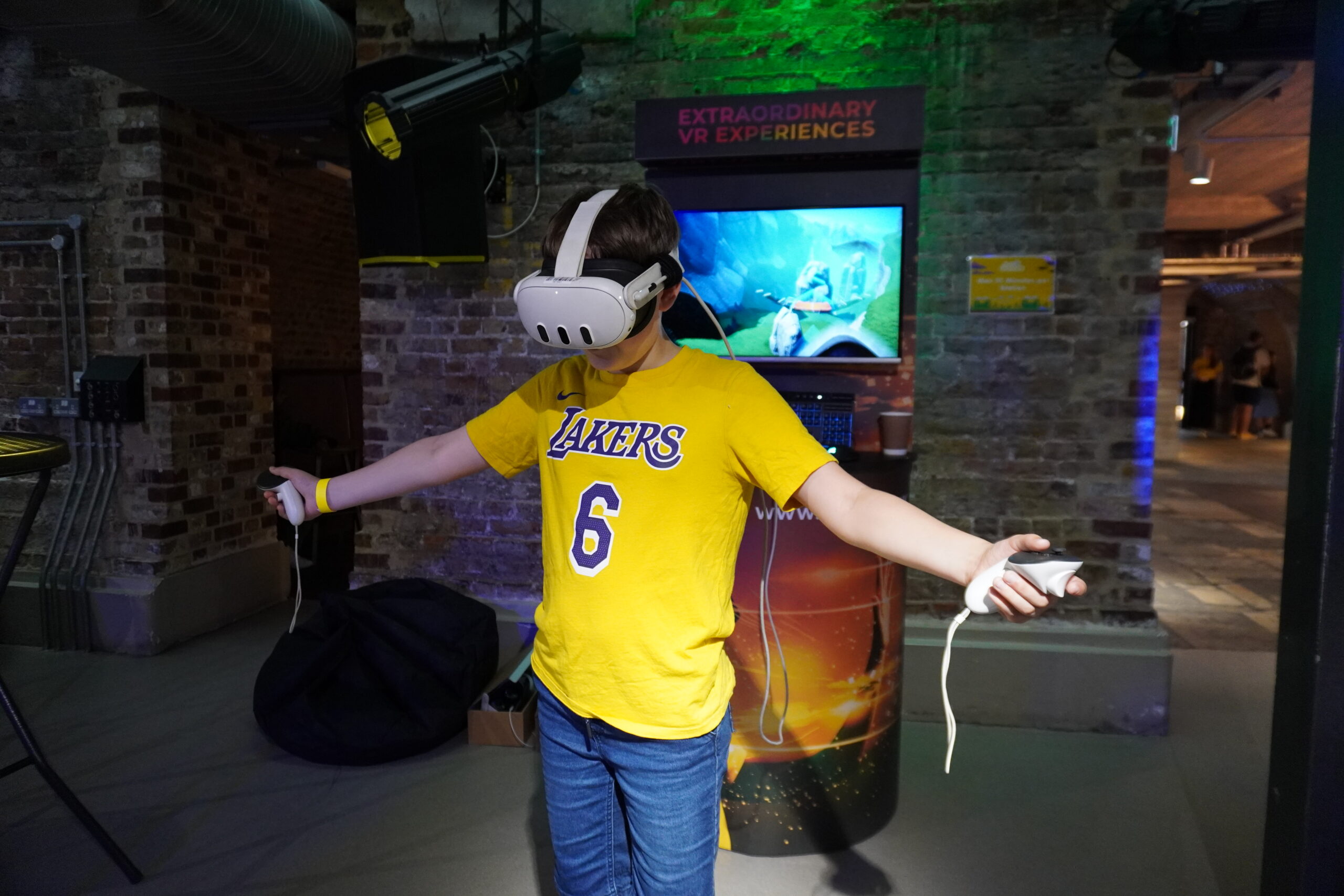 Young boy wearing a VR headset