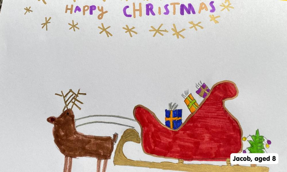 Child's drawing of a red sleigh being pulled by a reindeer