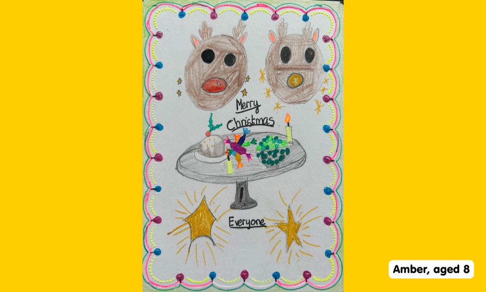 Child's drawing of two reindeers, as well as a plate of Christmas cake and treats