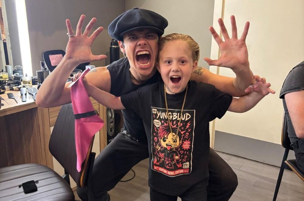 Otis and YUNGBLUD posing for a picture with a scary face